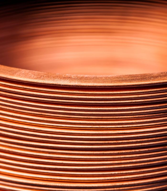close-up-flat-twisted-copper-wire-at-a-factory-2021-08-27-19-29-07-utc (1)-min